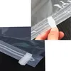 A collage of two images showing vacuum seal storage bags. One image shows a hand sealing a bag with a white tab, and the other shows a close-up of a bag with a plastic clip closure. Anteprima dell’immagine prodotto