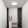 A modern hallway with a decorative figure and a marble shelf. Produktbild-Vorschau