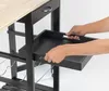 Hands pulling out a black tray from a kitchen cart. Produktbild-Vorschau