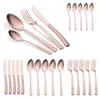 A collection of rose gold cutlery arranged on a white background. Podgląd zdjęcia produktu