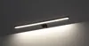 A linear LED light fixture mounted on a wall, illuminating the surface below. Náhľad obrázku produktu