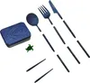 A set of disassembled cutlery and a small turtle figurine on a white background. Voir les images du produit