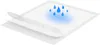 Diagram showing layers of a disposable pad with water droplets indicating absorbency. Voir les images du produit