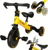 A yellow and black 3-in-1 trike with pedals is shown against a white background. Podgląd zdjęcia produktu