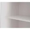 A close-up view of an empty shelf inside a wardrobe. Produktbild-Vorschau