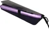A purple hair straightener is placed inside a black protective sleeve. Anteprima dell’immagine prodotto