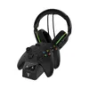 A black gaming headset and two black controllers are displayed on a white background. Produktbild-Vorschau