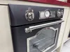 A close-up view of the control panel and oven door of a dark gray electric oven with silver accents. Produktbild-Vorschau
