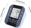 A digital blood pressure monitor with dimensions indicated. Produktbild-Vorschau