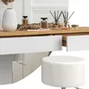 A vanity table with decorative items and a stool. Podgląd zdjęcia produktu