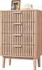 A light brown wooden dresser with four drawers is shown against a white background. Anteprima dell’immagine prodotto