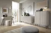 A modern living room or bedroom setting with furniture. Náhled obrázku produktu