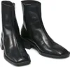 A pair of black leather ankle boots with square toes and block heels, presented on a white background. Produktbild-Vorschau