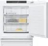 An open built-in freezer with multiple drawers. Produktbild-Vorschau