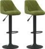 Two green velvet bar stools with black bases are shown against a white background. Náhled obrázku produktu
