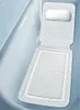 A white bath mat with a headrest is placed inside a bathtub. Podgląd zdjęcia produktu