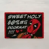 A doormat with Deadpool on it, placed on a light-colored wooden floor. Produktbild-Vorschau