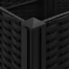 A close-up view of the corner of a black woven planter box. Náhľad obrázku produktu