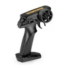 A black remote control for an RC car, shown against a white background. Voir les images du produit