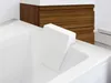 A close-up view of a white bathtub with a white headrest. Produktbild-Vorschau