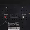 The back panel of a compact stereo system showing various ports and labels. Náhled obrázku produktu