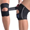 Two knees wearing black knee braces, one being adjusted. Produktbild-Vorschau