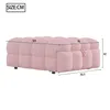 A pink upholstered ottoman with dimensions indicated by lines and numbers. Anteprima dell’immagine prodotto