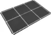 A set of interlocking black puzzle mats arranged on a white surface. Voir les images du produit