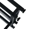 A close-up view of the black metal legs and adjustable feet of a table. Anteprima dell’immagine prodotto