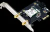 A close-up, angled view of a wireless network adapter card against a black background. Náhľad obrázku produktu