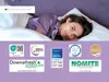 A woman is lying in bed, smiling at the camera. Below the image are several certification logos and brand names. Produktbild-Vorschau