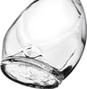 A close-up, angled view of the bottom of a clear glass bottle, showing the base and part of the body. Anteprima dell’immagine prodotto