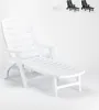 A white plastic sun lounger is shown against a white background. Smaller images of the same sun lounger in different colors (white, dark green, black) are visible in the top right corner. Voir les images du produit