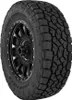 A close-up of a Toyo Open Country A/T III tire mounted on a black wheel. Produktbild-Vorschau