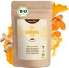 A bag of turmeric powder with turmeric roots and slices. Produktbild-Vorschau
