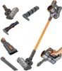 A collection of vacuum cleaner parts and accessories arranged around the main vacuum cleaner body. Produktbild-Vorschau