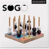 A SOGO game with wooden pegs and black and white beads on a colorful wooden base. Produktbild-Vorschau
