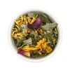 A top-down view of a white bowl filled with dried herbal tea ingredients. Anteprima dell’immagine prodotto