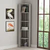 A corner bookshelf with books and decorative items next to a window. Voir les images du produit