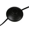 A close-up of a black foot switch for a lamp. Podgląd zdjęcia produktu