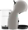 Side view of a gray coffee capsule machine with a transparent water tank. Náhled obrázku produktu