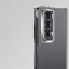 A close-up shot of the back of a smartphone in a clear protective case, showing the camera module. Podgląd zdjęcia produktu