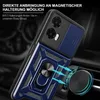 A close-up of a blue and black phone case with a ring holder, attached to a magnetic car vent mount. Produktbild-Vorschau