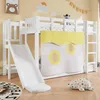 A children's bunk bed with a slide and curtains, set up in a bedroom. Produktbild-Vorschau