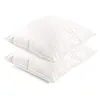 Two white pillows stacked on a white background. Produktbild-Vorschau
