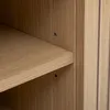 A close-up view of a wooden shelf and the side panel of a piece of furniture. Produktbild-Vorschau