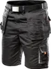 A close-up view of black work shorts with multiple pockets and a belt. Náhled obrázku produktu