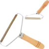Two lint removers with wooden handles and metal blades are shown against a white background. Produktbild-Vorschau