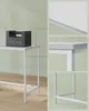 A collage showing details of a white desk with a weight on top, and close-ups of its construction. Náhled obrázku produktu