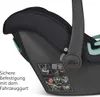 A close-up view of a black baby car seat with green accents, showing instructional diagrams and text on the side. Anteprima dell’immagine prodotto